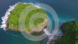 Aerial view of tropical ocean with beautiful islets covered with greenery lush.