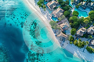 Aerial view of a tropical resort with overwater villas