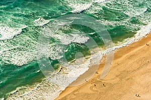 Aerial view of tropical sandy beach ans sea, ocean waves