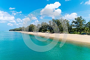 Aerial view of tropical sea beautiful beach and clear blue sky white clouds in summer season