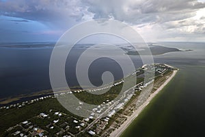 Aerial view of tropical storm over expensive residential houses in island small town Boca Grande on Gasparilla Island in