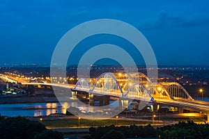 Aerial view of Tru bridge crossing Red River at twilight in Hanoi, Vietnam