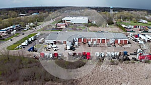 Aerial view of Truck repair shop, Service building and many trucks near it