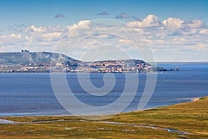 Aerial view of the tundra, estuary and a small northern city