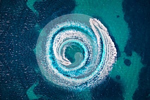 Aerial view of two motorboats over turquoise sea