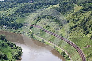 Aerial view two trains along the river Moselle in Germany