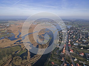 Aerial view of Tykocin suburbs and Narew river