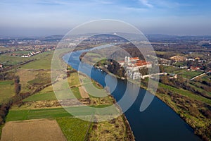 Aerial view of Tyniec Benedictine abbey, Vistula river, Cracow and Silver Mount with Camaldolese Hermit Monastery. Poland, autumn