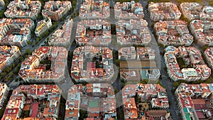 Aerial view of typical buildings of Barcelona cityscape. Eixample urban grid photo