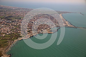 Aerial view of the Tyrrhenian coastline and Fiumicino town, near
