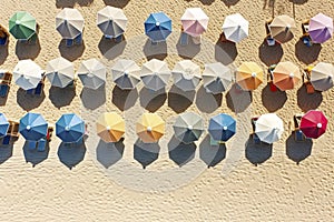 Aerial view of umbrellas on a beach. Ai generated