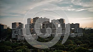 Aerial view of a unique architectural residence, the Interlace Condominium.