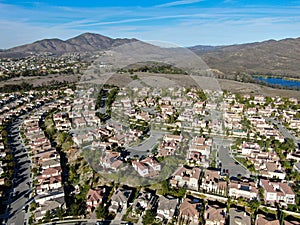 Aerial view of upper middle class neighborhood with identical residential subdivision house