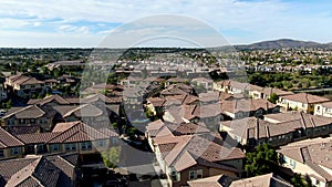 Aerial view of upper middle class neighborhood with identical residential subdivision house