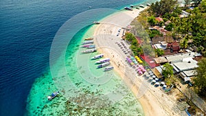 Aerial view of the upper reef flat of a fringing coral reef on a small tropical island