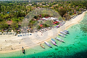 Aerial view of the upper reef flat of a fringing coral reef on a small tropical island