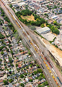 Aerial view of an urban landscape with a railyard