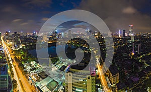 Aerial view of urban skyline at twilight. Hanoi cityscape. Thanh Cong lake and Lang Ha street