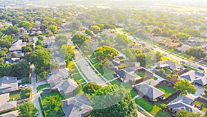 Aerial view urban sprawl subdivision near Dallas, Texas, USA row of single family homes large fenced backyard