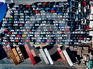 Aerial view of used cars lined up in the port