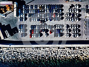 Aerial view of used cars lined up in the port