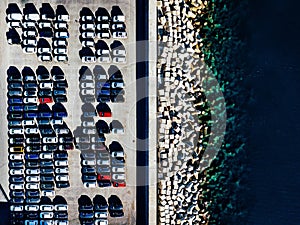 Aerial view of used cars lined up in the port