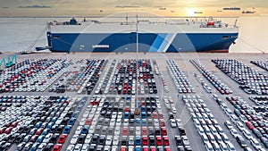 Aerial view vehicle carrier vessel loading car for shipping to worldwide, Large RoRo Roll on/off vehicle car carrier, New car photo