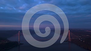 Aerial view of vehicles passing over Istanbul Yavuz Sultan Selim Bridge in sunrise light