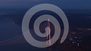 Aerial view of vehicles passing over Istanbul Yavuz Sultan Selim Bridge in sunrise light