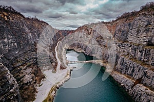 Aerial view of Velka Amerika,Big America,limestone quarry.Grand Canyon of Czech Republic.Labyrinth of caves,lake with crystal
