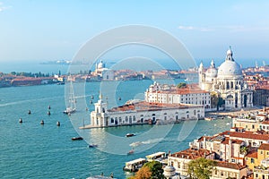 Aerial view of Venice, Santa Maria della Salute with Guidecca during early morning summer day. World famous Venice landmark. View