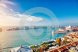Aerial view of Venice, Santa Maria della Salute with Guidecca during early morning summer day. World famous Venice landmark. View