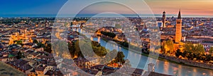 Aerial view of Verona citycityscape day to night transition and