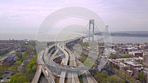 Aerial view of Verrazano bidge and overpass in Brooklyn, New York City. NYC from above Hudson river.
