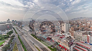 Aerial view of Via Expresa highway and metropolitan bus with traffic timelapse. Lima, Peru photo