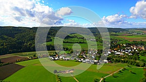 Aerial view of village of Holsthum, Germany with a Roman villa ruin in a field