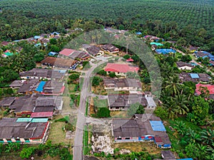 Aerial view of village houses in Felda Air Tawar 4, Kota Tinggi, Johor, Malaysia.