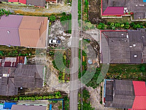 Aerial view of village houses in Felda Air Tawar 4, Kota Tinggi, Johor, Malaysia.