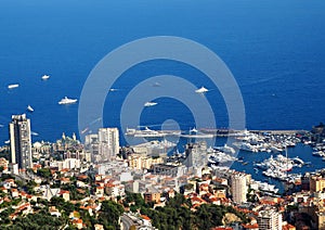 Aerial view from village La Turbie to Principality Monaco, Monte-Carlo, port Hercule, Prince Palace, Mountains, yachts, boats