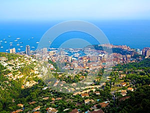 Aerial view from village La Turbie to Principality Monaco, Monte-Carlo, port Hercule, Prince Palace, Mountains, yachts, boats, sky