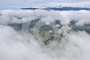 Aerial View of Village landscape and River over Clouds in Chiangdao , Thailand