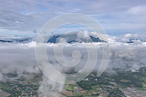 Aerial View of Village landscape and River over Clouds in Chiangdao , Thailand