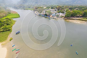 Aerial view of a village by the river photo