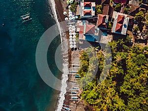 Aerial view of village with sea and boats in Bali, Amed