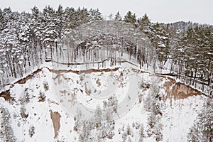 Aerial view of Vilnia river and snow covered geological Puckoriai exposure in Vilnius, the highest exposure in Lithuania