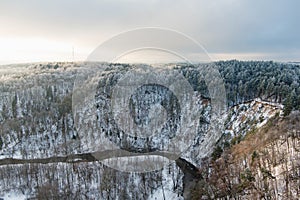 Aerial view of Vilnia river and snow covered geological Puckoriai exposure in Vilnius, the highest exposure in Lithuania