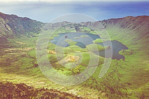 Aerial view of volcanic crater Caldeirao with a beautiful lake on the top of Corvo island. Azores islands, Portugal photo