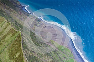 Aerial view of volcanic crater Caldeirao with a beautiful lake on the top of Corvo island. Azores islands, Portugal