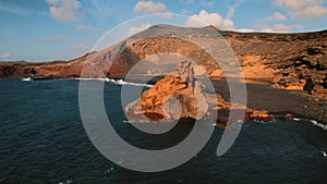 Aerial view volcanic green lake of Lanzarote Island. Spain