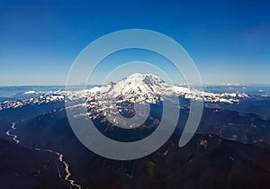 Aerial view of volcanic mountain peak in Pacific Northwest lands